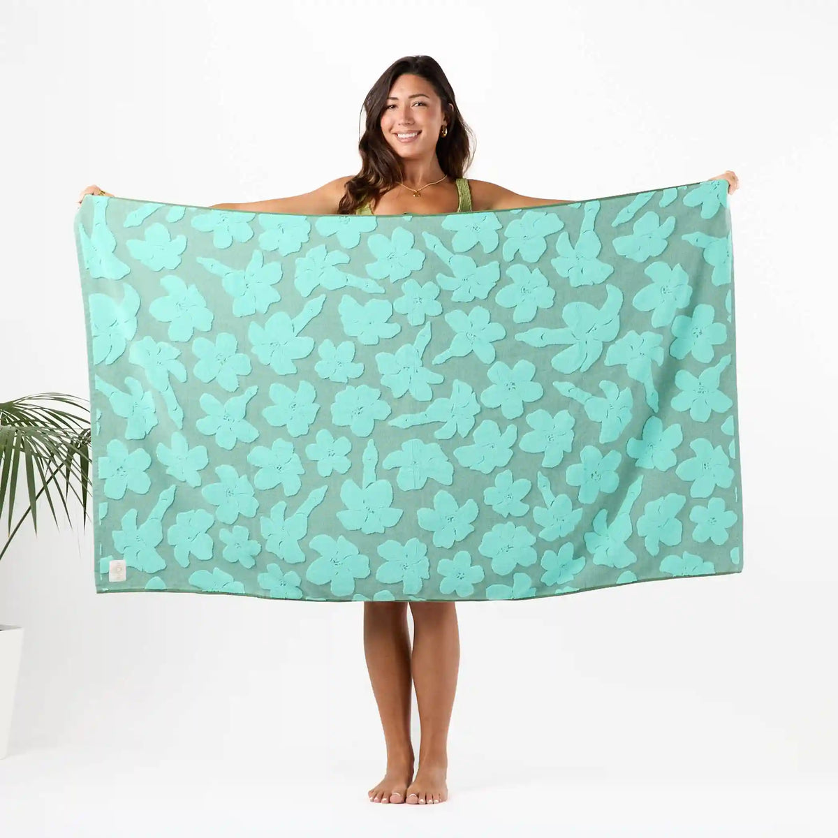 Puakenikeni Buds Beach Towel in Moss Main image